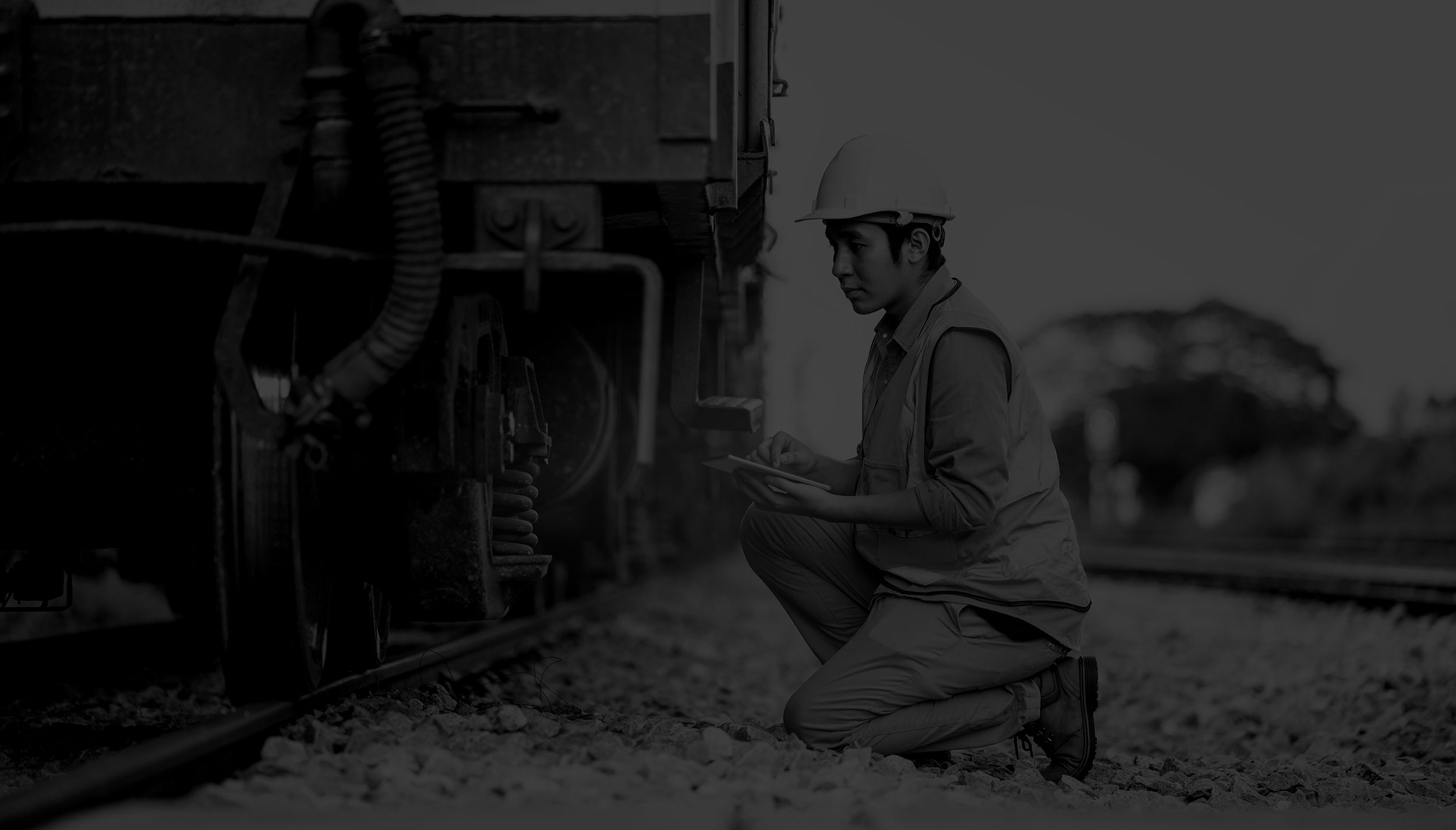 JDG_DB-Cargo-Case-Study_Background_Man-kneeling-Using-Ipad